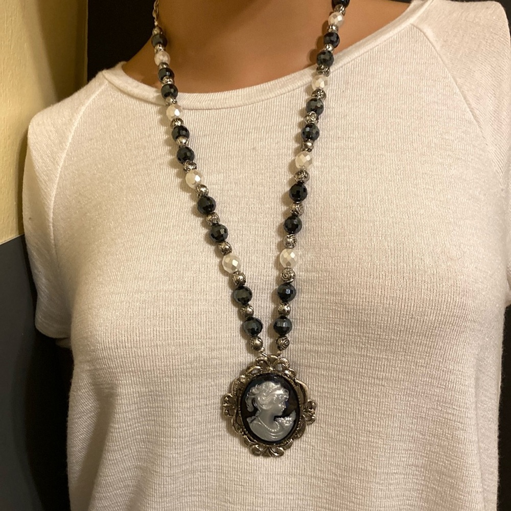 Large cameo pendant/brooch on black background on silver tone & beaded necklace